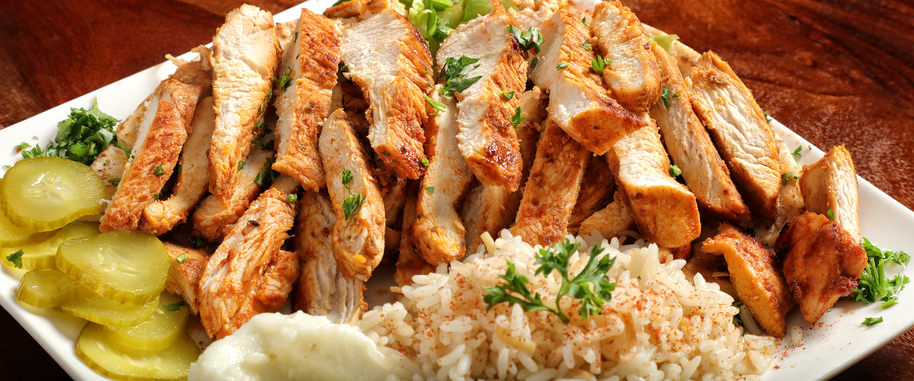 Chicken Shawarma Dish, Middle Eastern Food Middle Eastern Food dish on wooden table